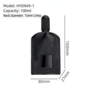 Matte black ribbed glass perfume bottle with gold and black atomizers and matching fluted caps