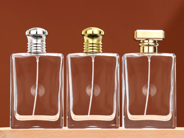 RX022-HYD802 100ml clear rectangular glass perfume bottle with gold and silver caps and crimp sprayer