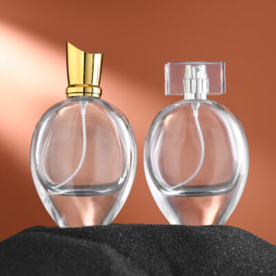 75ml transparent oval glass perfume bottle with gold silver sprayers and luxury acrylic electroplated lids