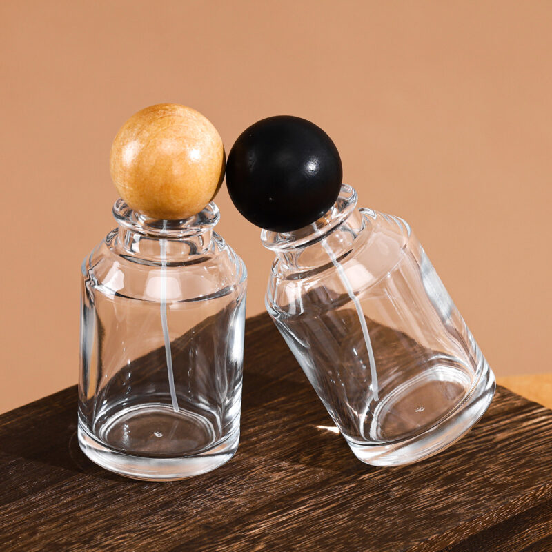 RX019-XB225 100ml Round Glass Perfume Bottle with Natural Wooden Ball Cap