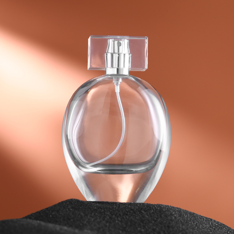RX011,75ml Elegant Oval Glass Perfume Bottle - Crimp Neck with Acrylic & Electroplated Caps