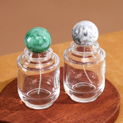 RX020-XB227 100ml clear round perfume bottle with colorful marble pattern resin ball caps and gold sprayers