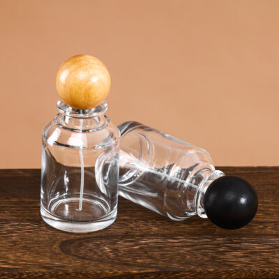 RX019-XB225 100ml Round Glass Perfume Bottle with Natural Wooden Ball Cap