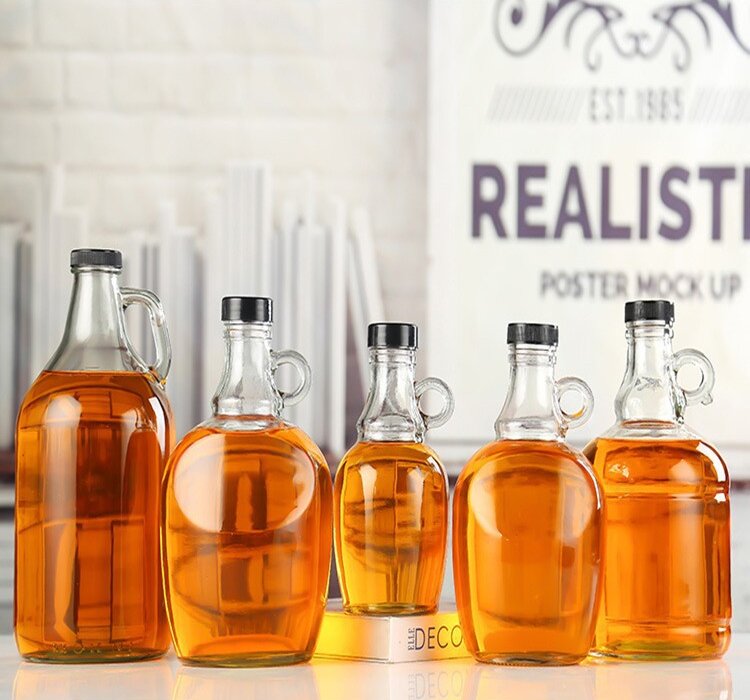 Amber and clear California glass jugs with finger handle for fermentation and storage, 500ml to 5000ml