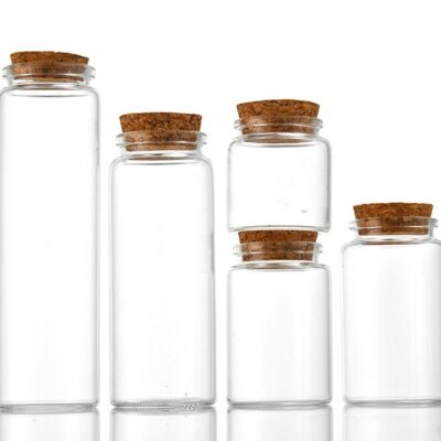 Clear tubular glass vial with natural cork stopper seal