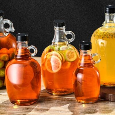 Amber and clear California glass jugs with finger handle for fermentation and storage, 500ml to 5000ml