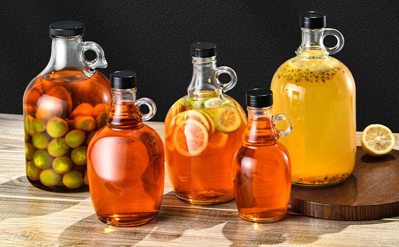 Amber and clear California glass jugs with finger handle for fermentation and storage, 500ml to 5000ml
