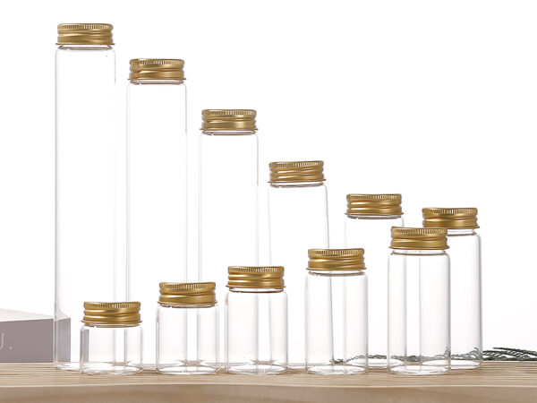 Clear glass vial with pre-painted golden aluminum screw cap
