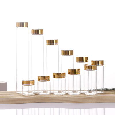Luxury borosilicate glass vial with gold anodized aluminum-plastic composite cap and pressure sensitive seal
