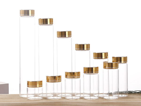 Luxury borosilicate glass vial with gold anodized aluminum-plastic composite cap and pressure sensitive seal