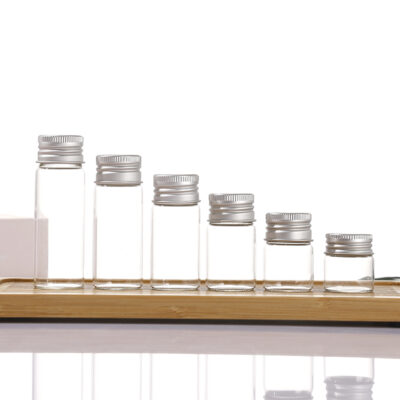 Clear borosilicate glass vials with silver aluminum screw caps, 5ml to 20ml+