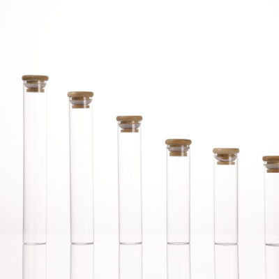 Eco-friendly glass vials with various wood grain and natural wood lids