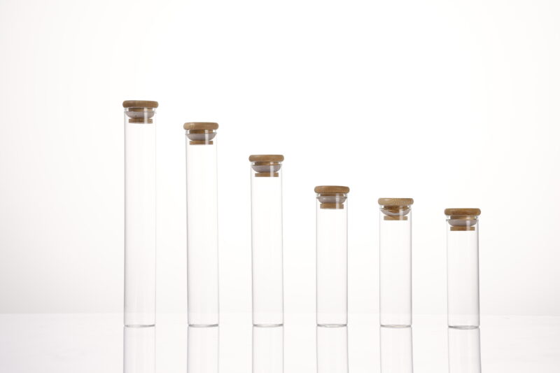 Eco-friendly glass vials with various wood grain and natural wood lids