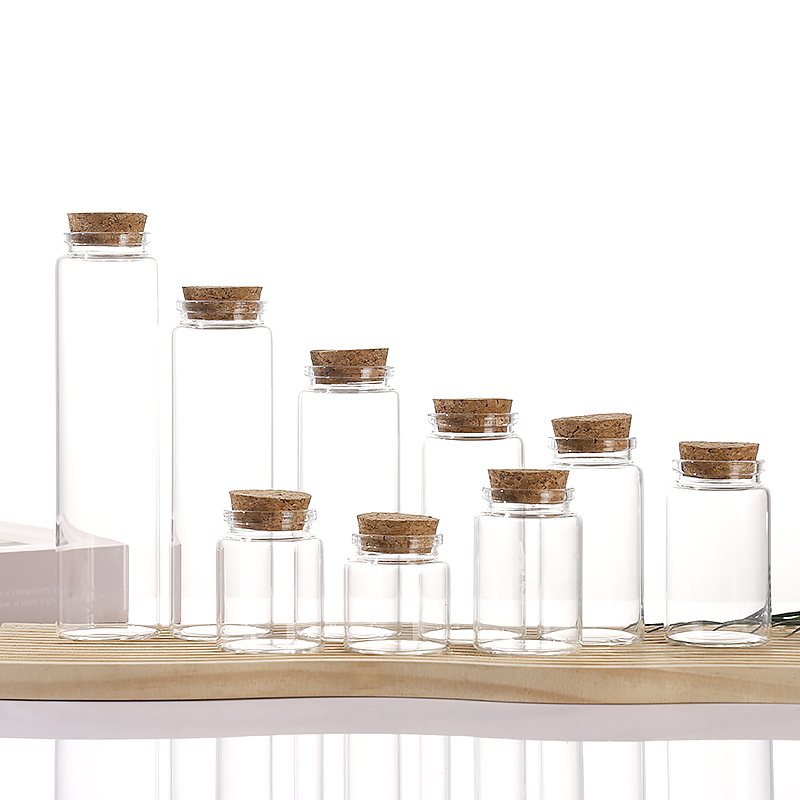 Borosilicate glass vial with bayonet neck and natural cork stopper