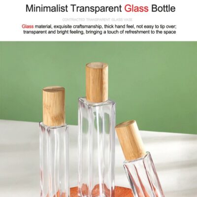 Clear glass perfume bottle with fine mist sprayer and natural bamboo overcap