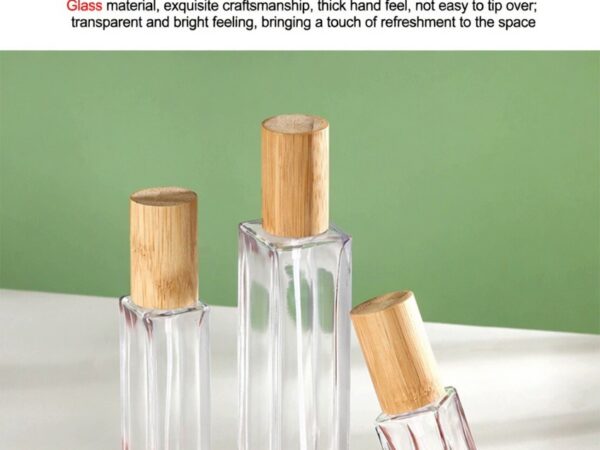 Clear glass perfume bottle with fine mist sprayer and natural bamboo overcap