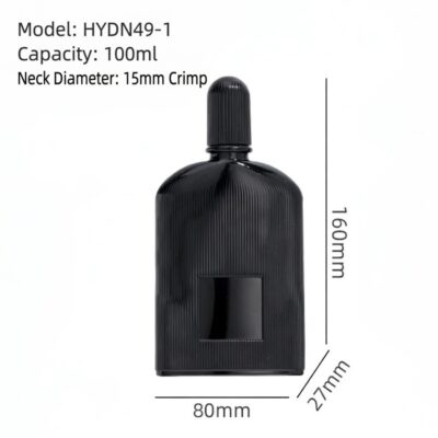 Matte black ribbed glass perfume bottle with gold and black atomizers and matching fluted caps