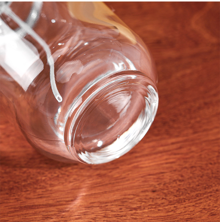 RX020-XB227 100ml Circular Glass Perfume Bottle with Large Marble Resin Sphere Cap